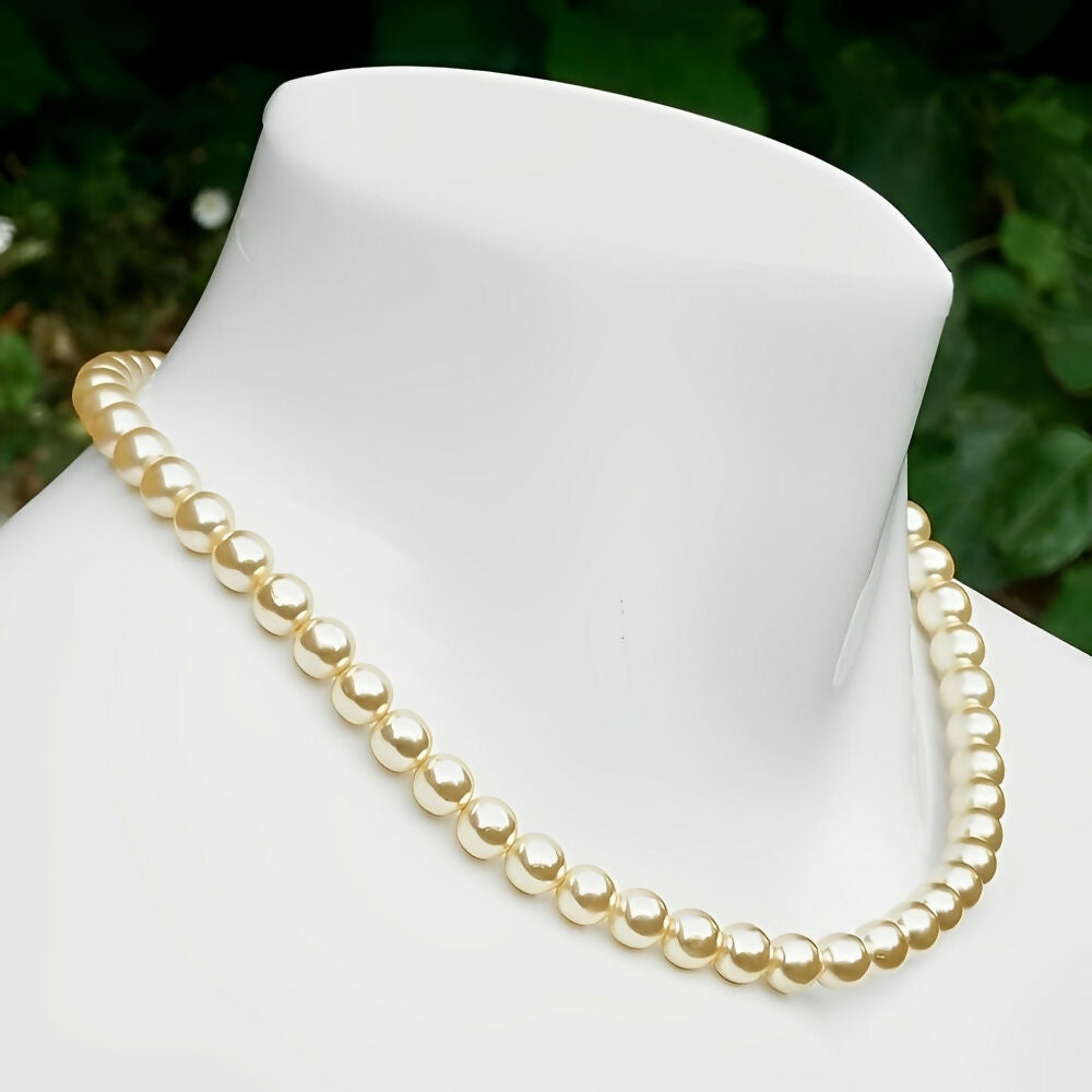 aura-champagne-glass-pearl-necklace-with-a-gold-plated-and-pearl-flower-clasp-3p