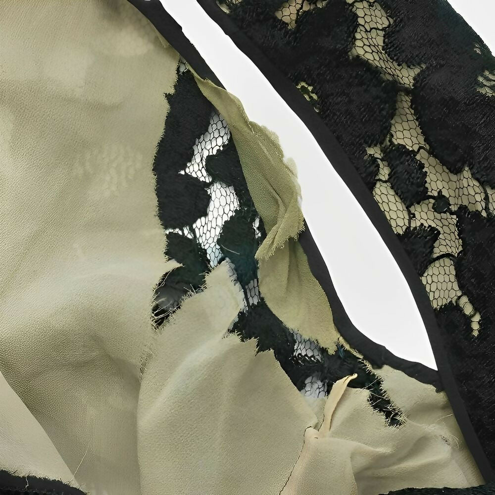 black-sleeveless-lace-dress-in-a-flower-design-with-front-ruffle-circa-1930s-10p