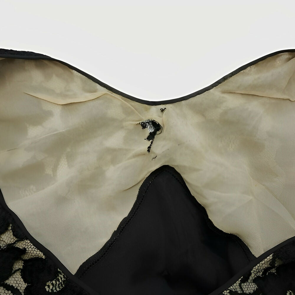 black-sleeveless-lace-dress-in-a-flower-design-with-front-ruffle-circa-1930s-9p