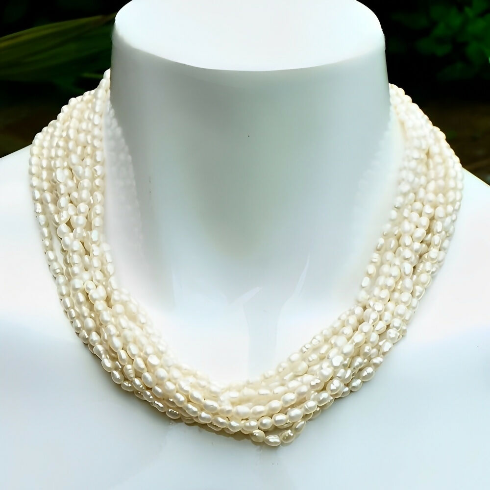 ten-strand-baroque-rice-pearl-necklace-gold-plated-faux-pearl-clasp-circa-1970s-2p