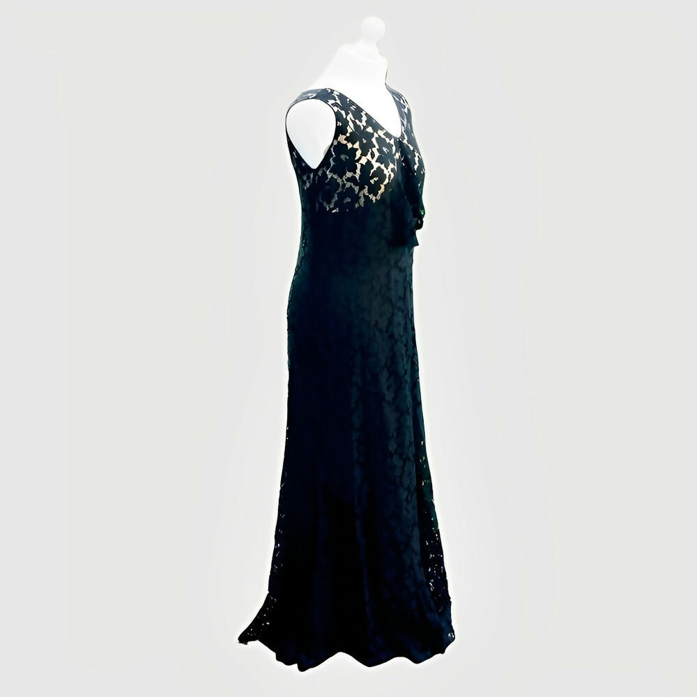 black-sleeveless-lace-dress-in-a-flower-design-with-front-ruffle-circa-1930s-3p