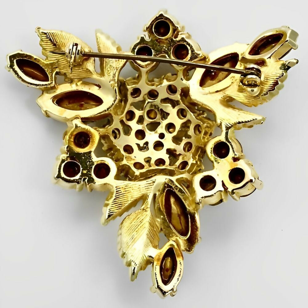 triangular-gold-tone-leaf-and-flower-design-brooch-with-green-orange-and-brown-crystals-4z