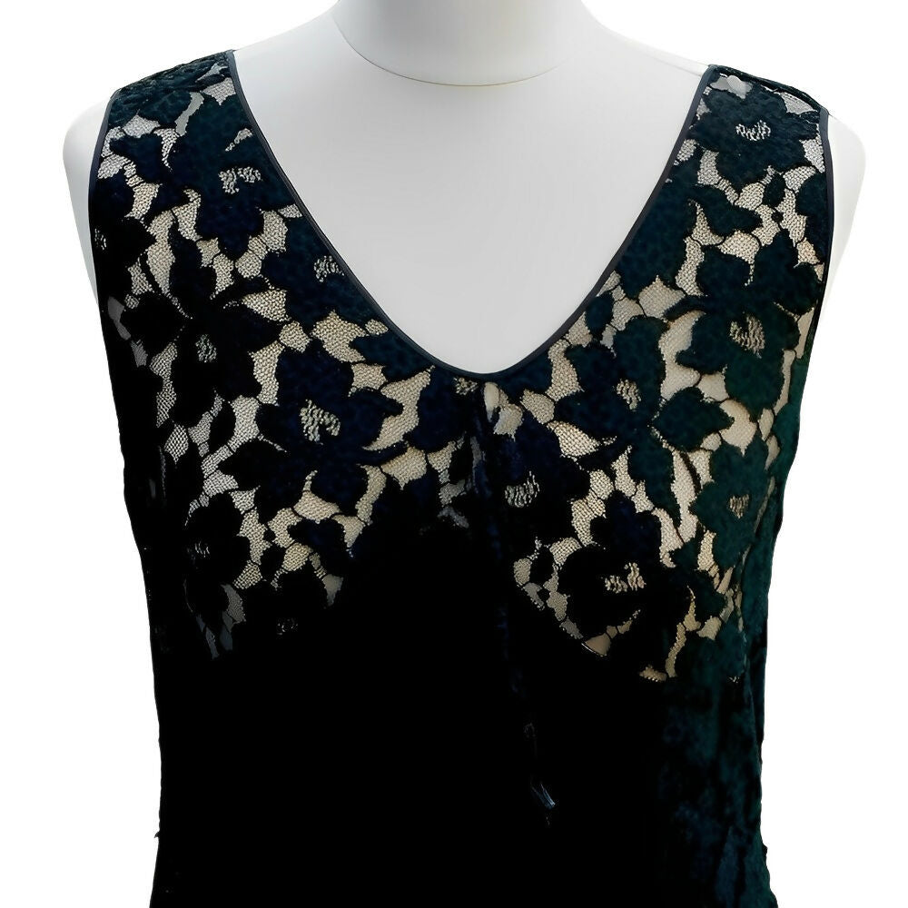 black-sleeveless-lace-dress-in-a-flower-design-with-front-ruffle-circa-1930s-2p
