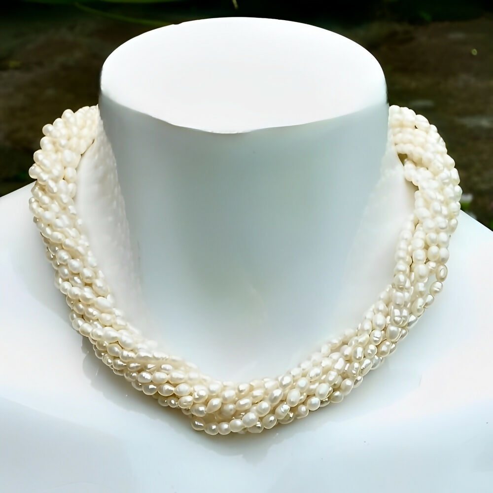 ten-strand-baroque-rice-pearl-necklace-gold-plated-faux-pearl-clasp-circa-1970s-8p