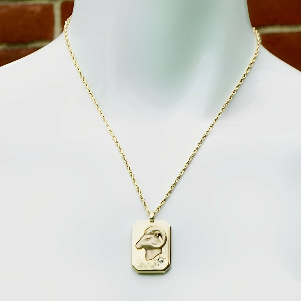 pierre-cardin-gold-tone-aries-zodiac-pendant-necklace-set-with-a-diamond-4p