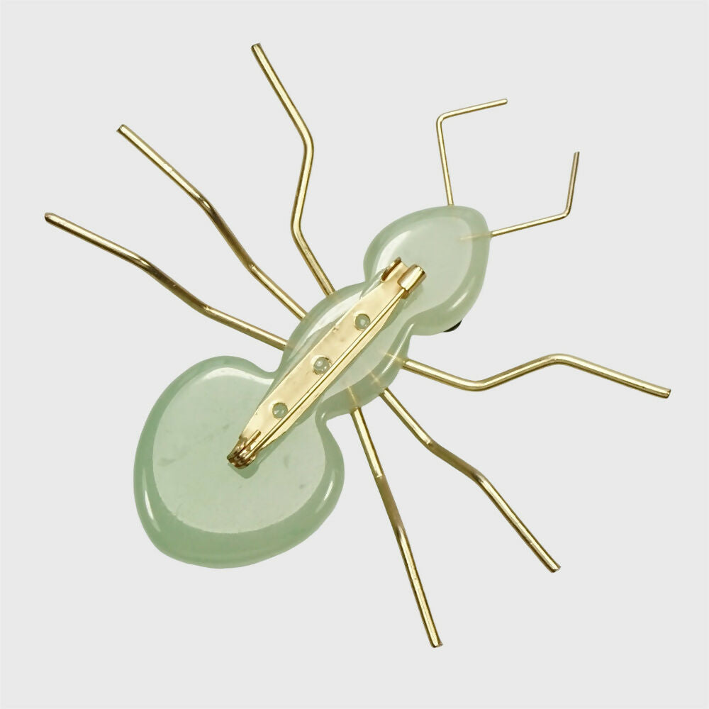 light-green-stylized-resin-ant-brooch-with-gold-tone-legs-and-feelers-6p