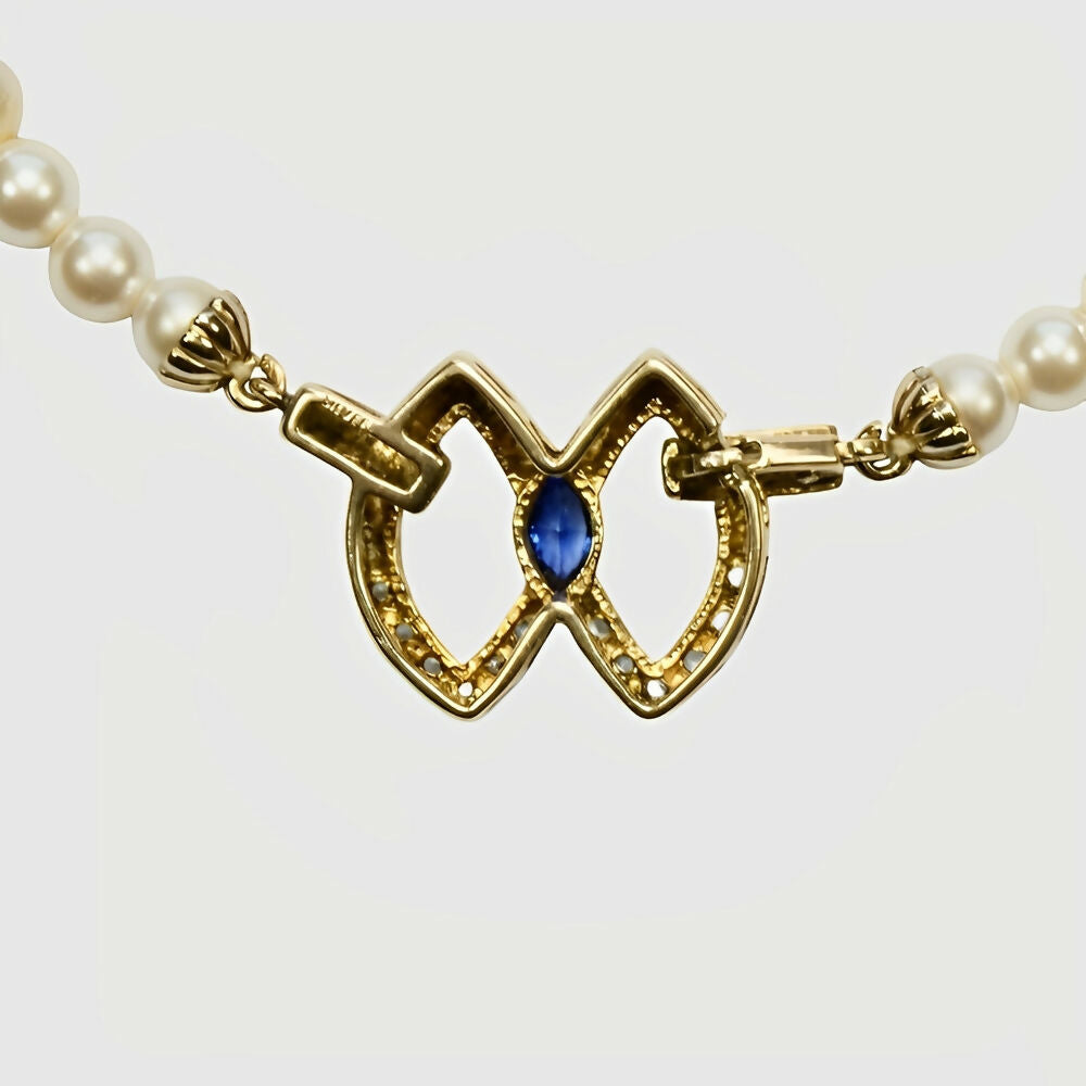 faux-pearl-necklace-with-a-blue-stone-silver-and-gold-wash-pendant-clasp-6p
