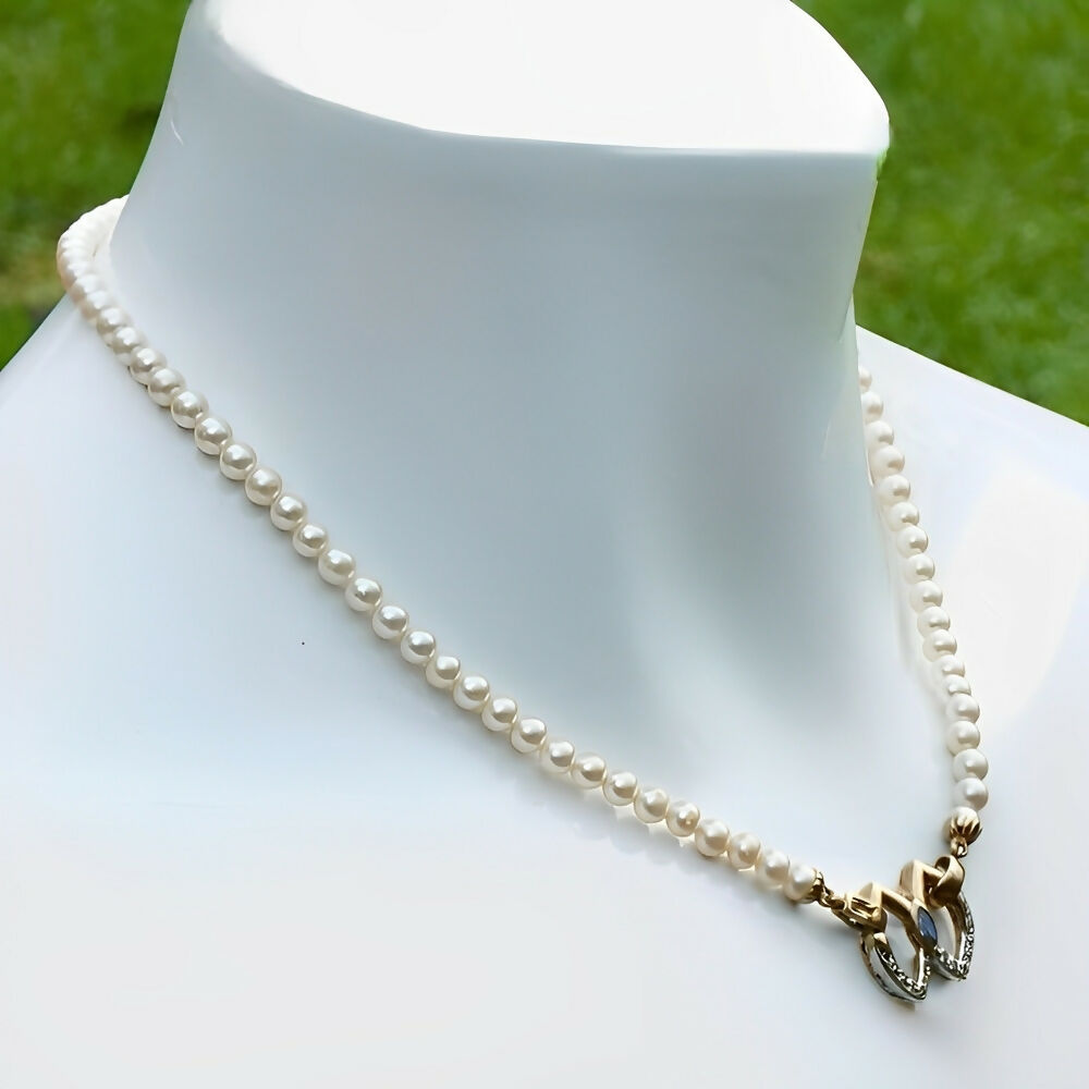 faux-pearl-necklace-with-a-blue-stone-silver-and-gold-wash-pendant-clasp-3p