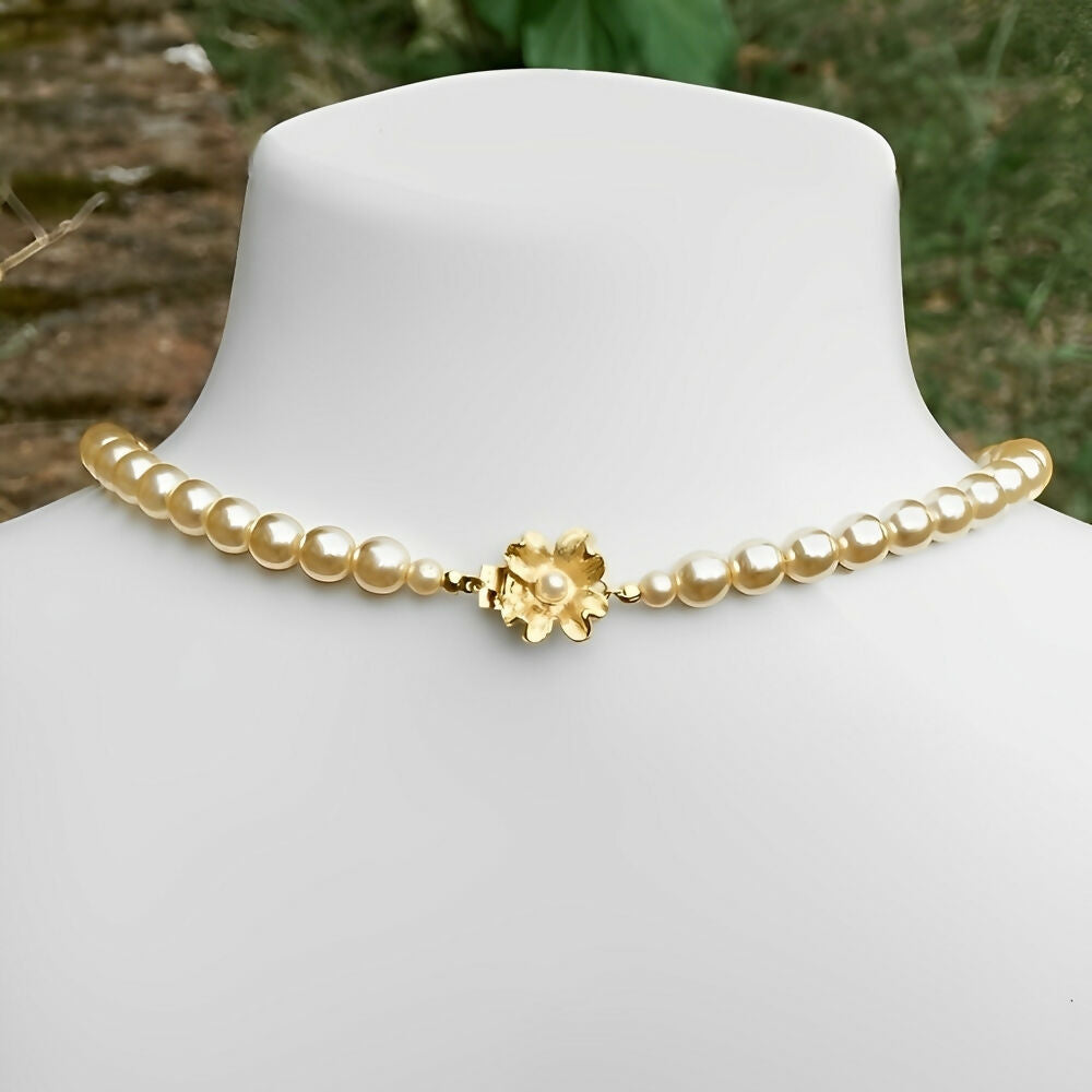 aura-champagne-glass-pearl-necklace-with-a-gold-plated-and-pearl-flower-clasp-4p