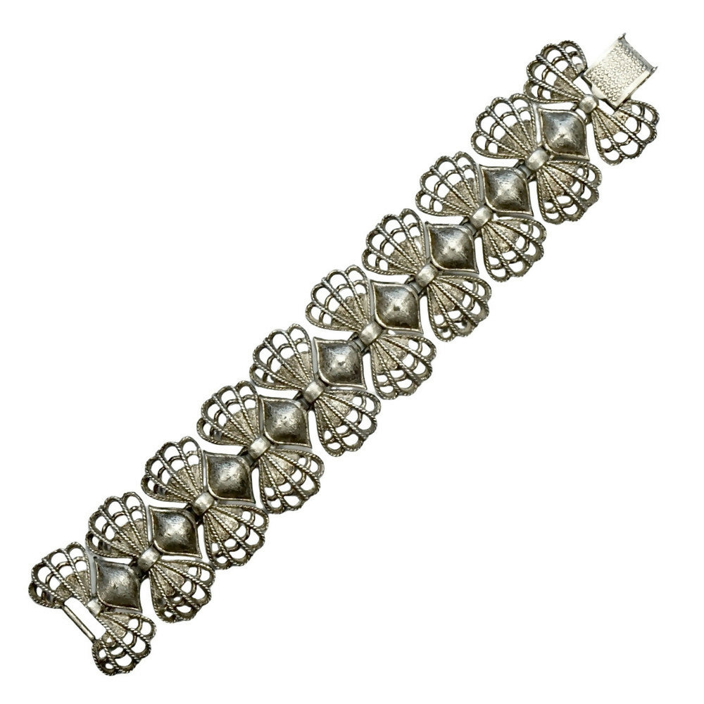 coro-silver-tone-link-bracelet-with-wire-mesh-bow-design-links-1p