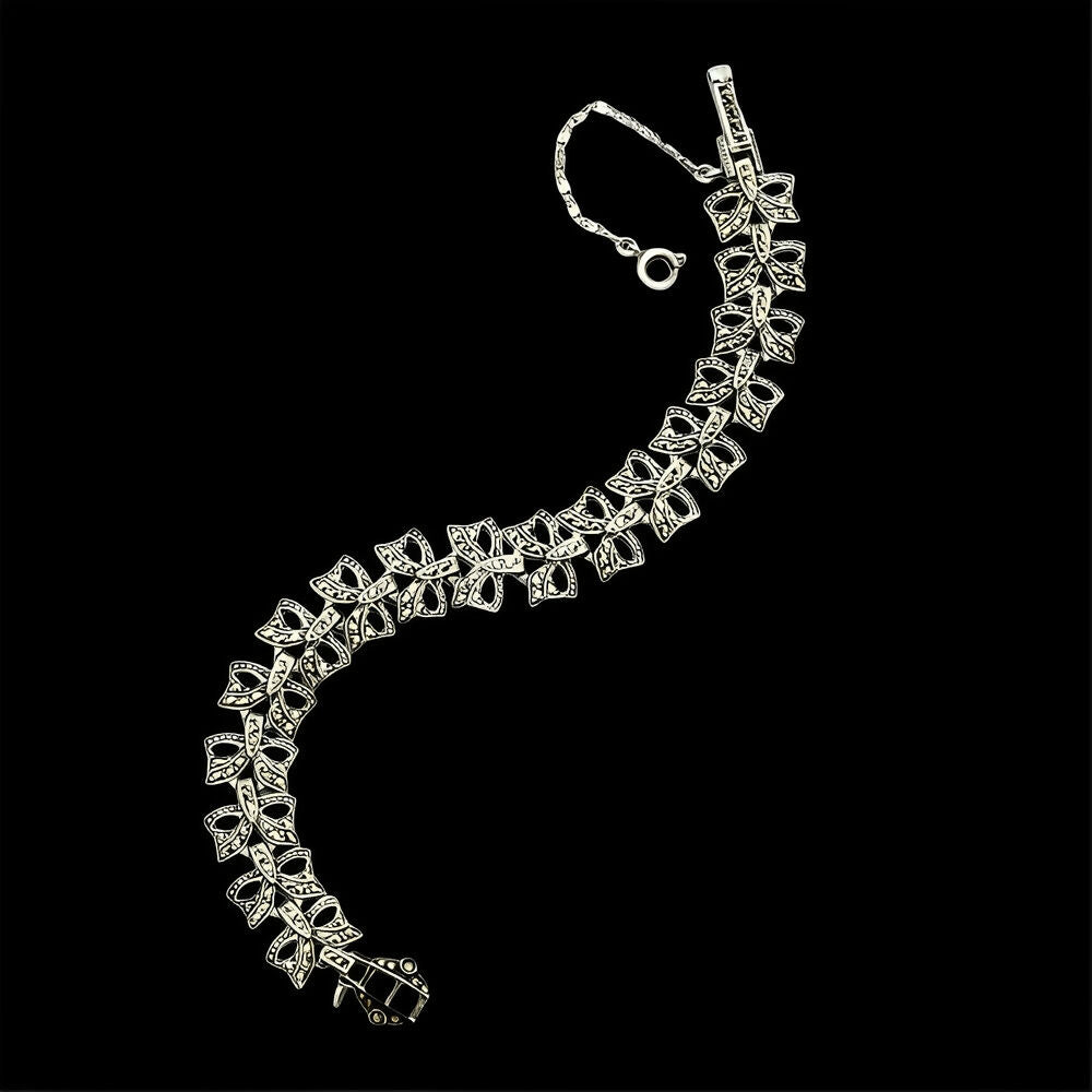 silver-and-marcasite-bow-design-link-bracelet-circa-1930s-8p