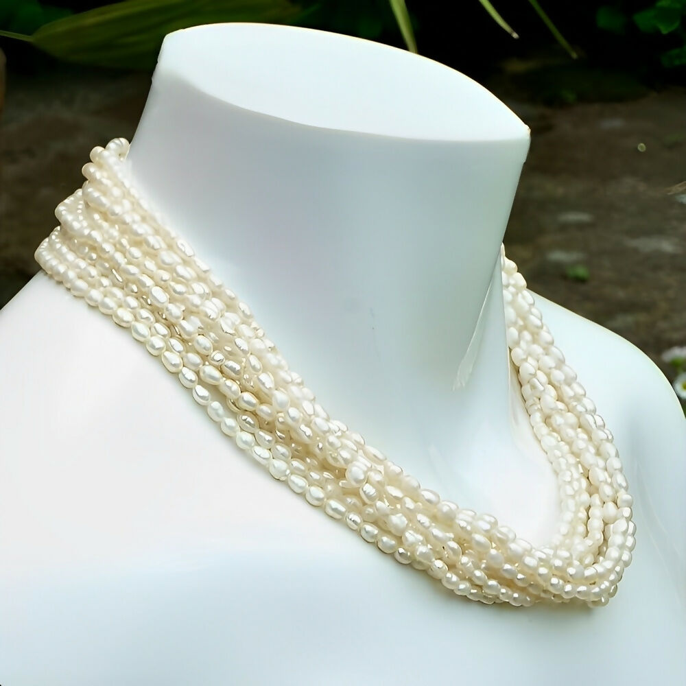 ten-strand-baroque-rice-pearl-necklace-gold-plated-faux-pearl-clasp-circa-1970s-3p