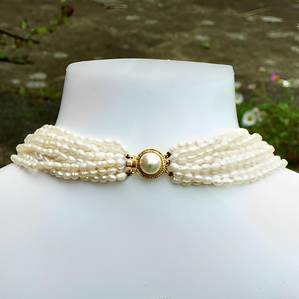 ten-strand-baroque-rice-pearl-necklace-gold-plated-faux-pearl-clasp-circa-1970s-4p