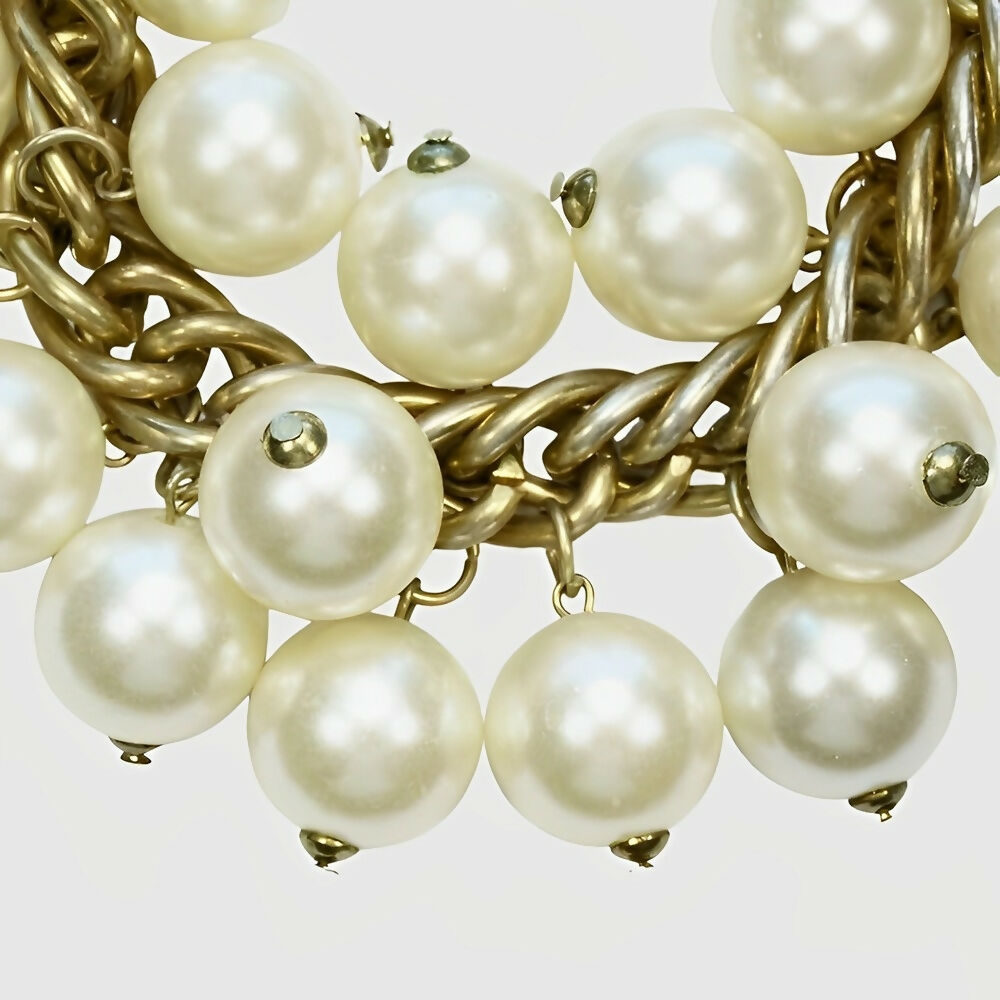 gold-plated-and-ivory-faux-pearl-cha-cha-bracelet-circa-1980s-3p
