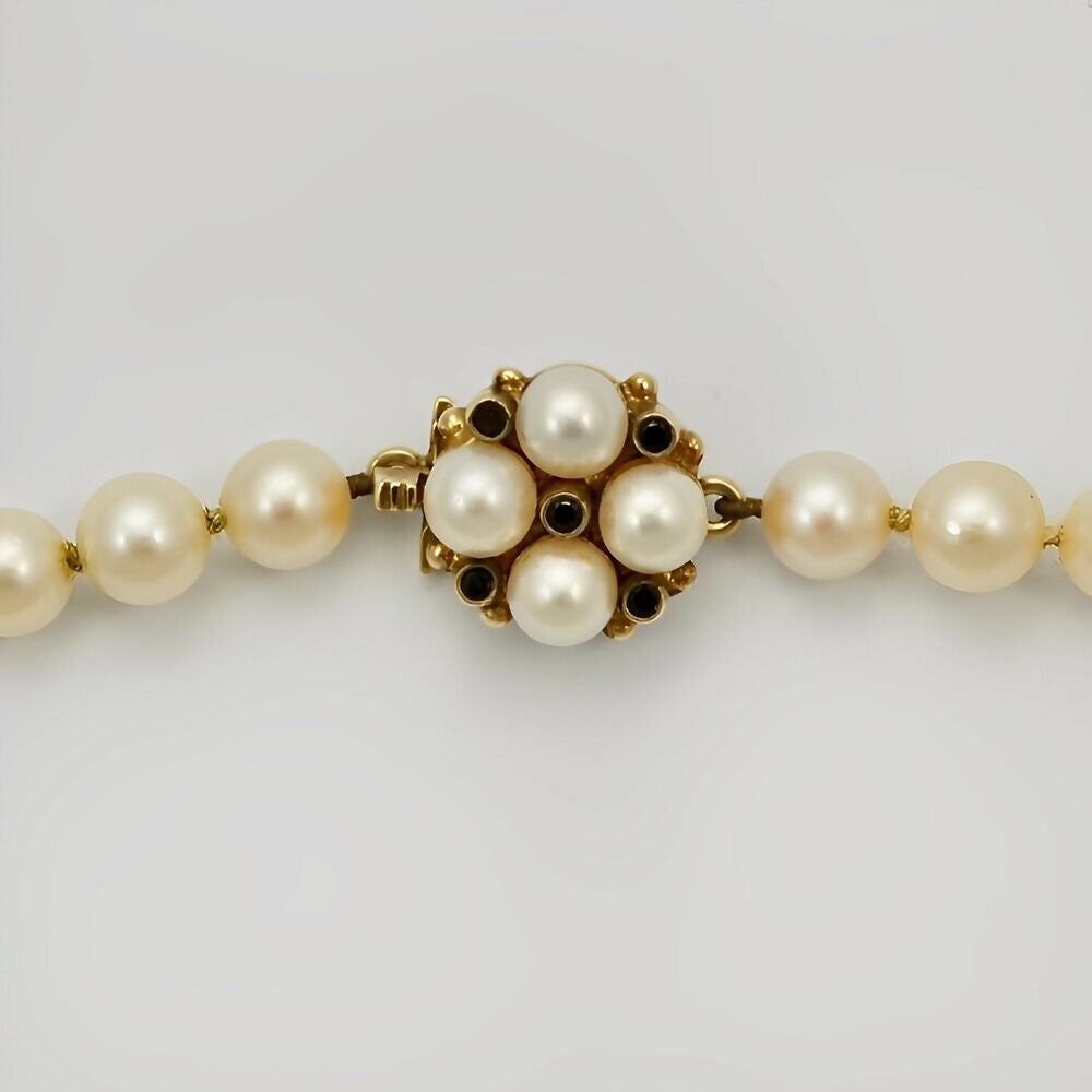 graduated-cream-cultured-pearl-necklace-with-9k-gold-and-cultured-pearl-clasp-3p