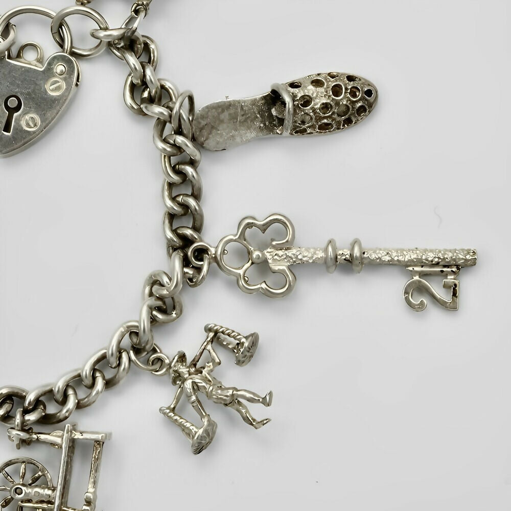 english-sterling-silver-charm-bracelet-1970s-5p