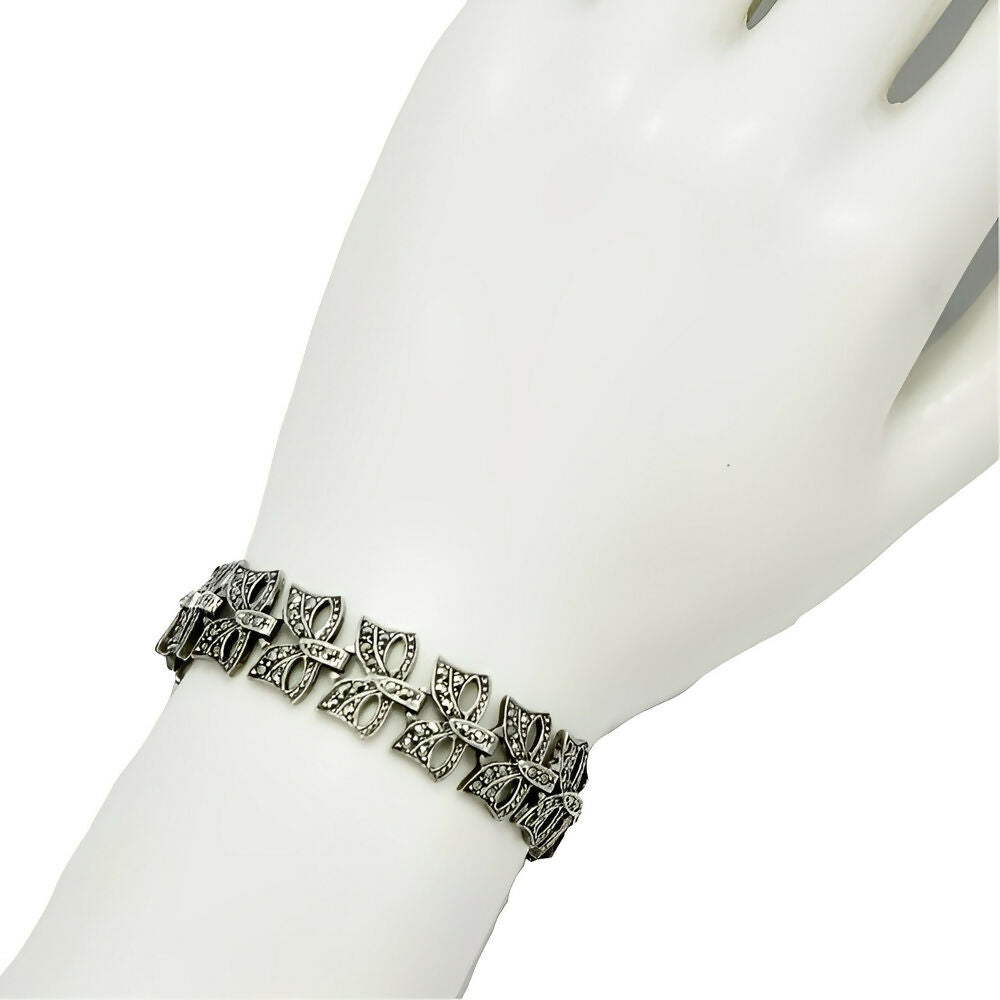 silver-and-marcasite-bow-design-link-bracelet-circa-1930s-7p