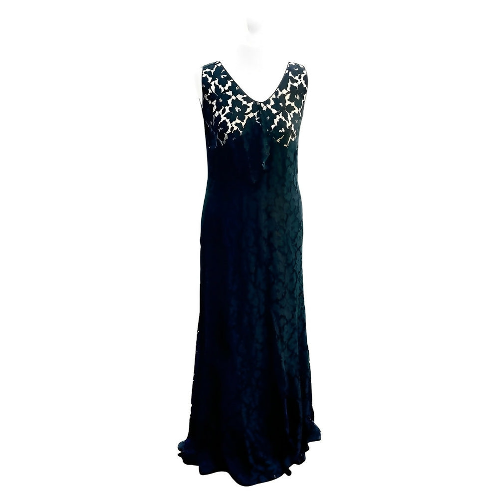 black-sleeveless-lace-dress-in-a-flower-design-with-front-ruffle-circa-1930s-1p